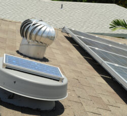 Solar,powered,attic,fan,helps,to,cool,down,residential,home